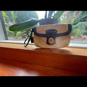 Classic Coach wristlet with leather strap